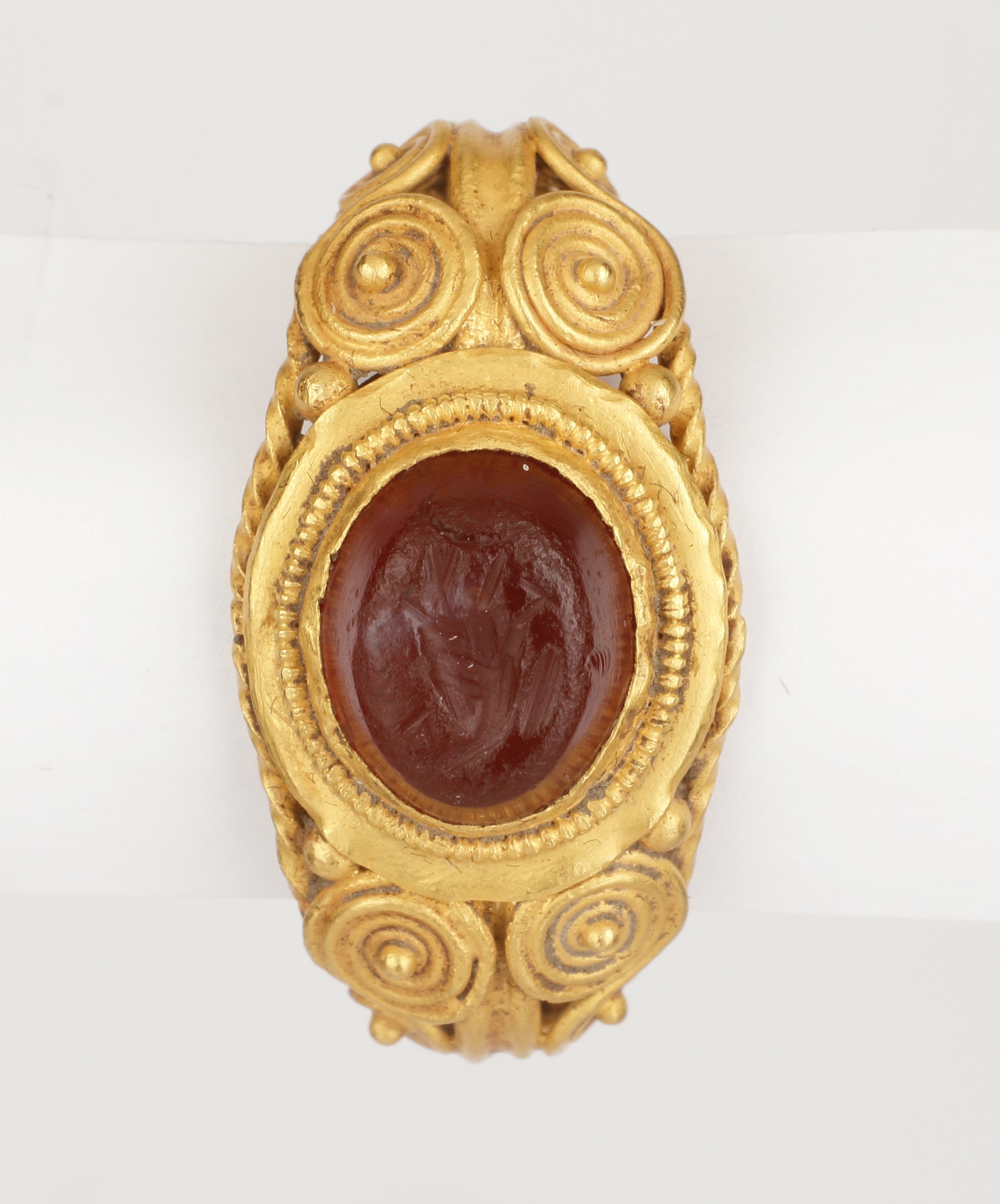 A Romano-British Finger-Ring with Filigree Wire Decoration and Carnelian Military Intaglio